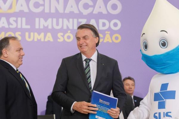 O Presidente Jair Bolsonaro, participa do lan&ccedil;amento do Plano Nacional de Operacionaliza&ccedil;&atilde;o da Vacina&ccedil;&atilde;o Contra a Covid-19. (Imagem:Isac N&oacute;brega/PR)